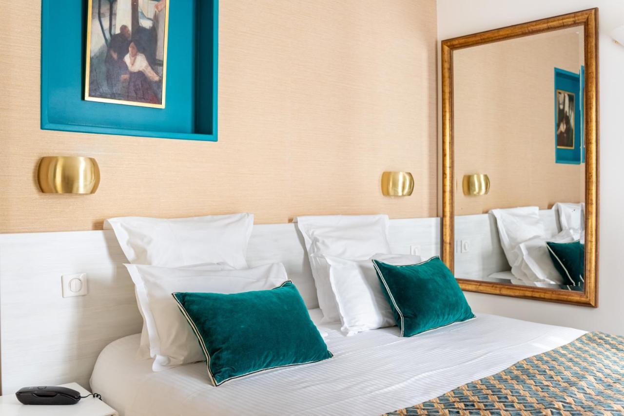 Queens Boutique Hotel Paris Bagian luar foto