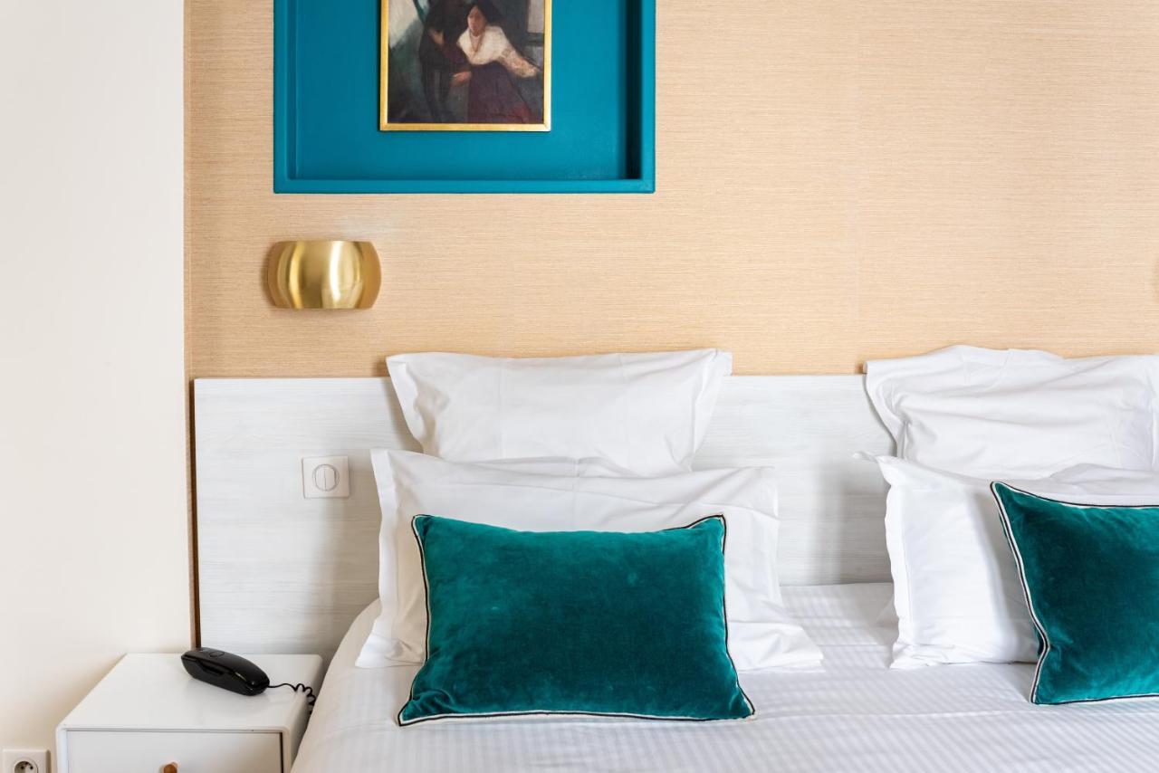 Queens Boutique Hotel Paris Bagian luar foto